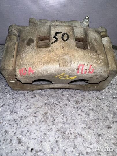 Суппорт передний левый Kia Carnival KA4 3.5 G6DT