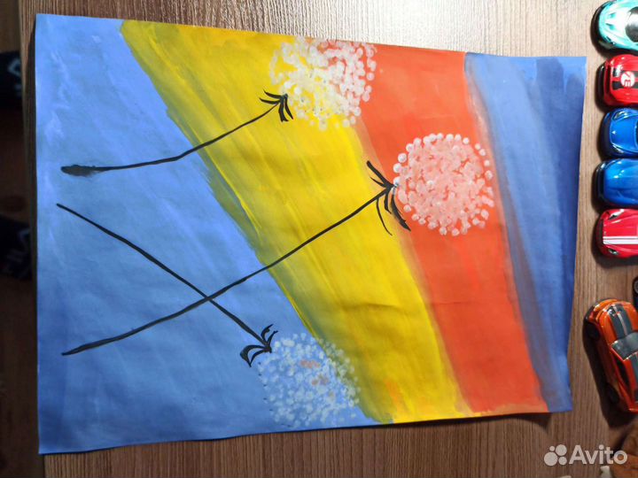 Одуванчики на разноцветном листе