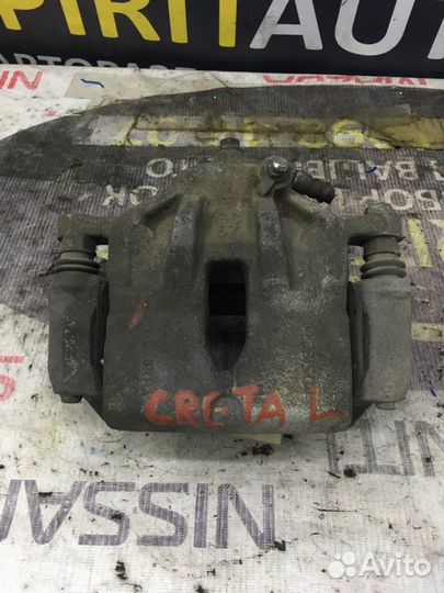 Суппорт тормозной передний левый Hyundai Creta 1