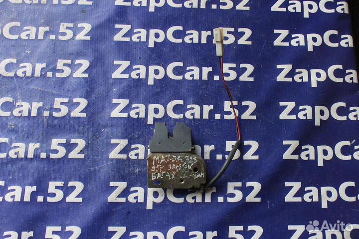 Замок багажника Мазда 323 BA ба