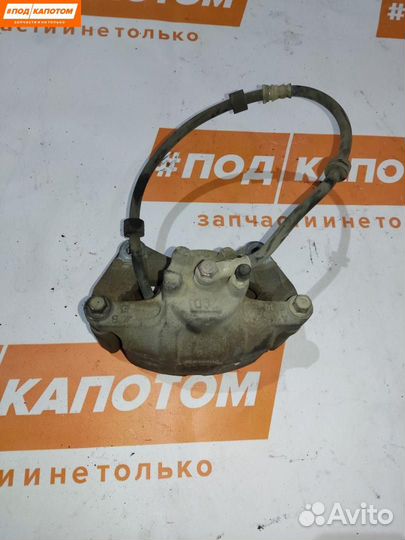 Суппорт тормозной передний левый Mitsubishi Lancer