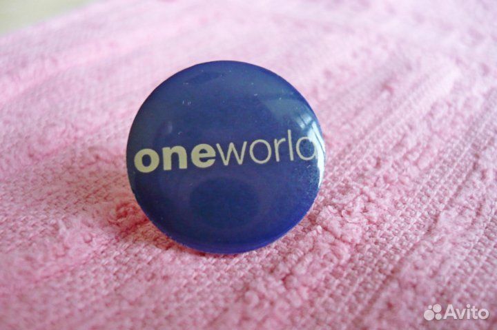 Oneworld - значок авиационного альянса