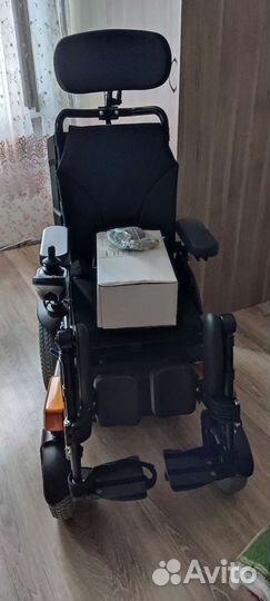 Электрическая инвалидная коляска
