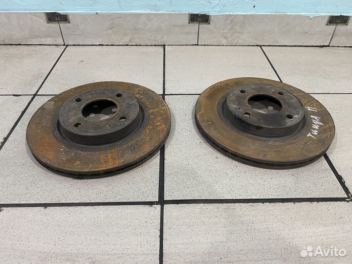 Тормозной диск передний Nissan tiida C11