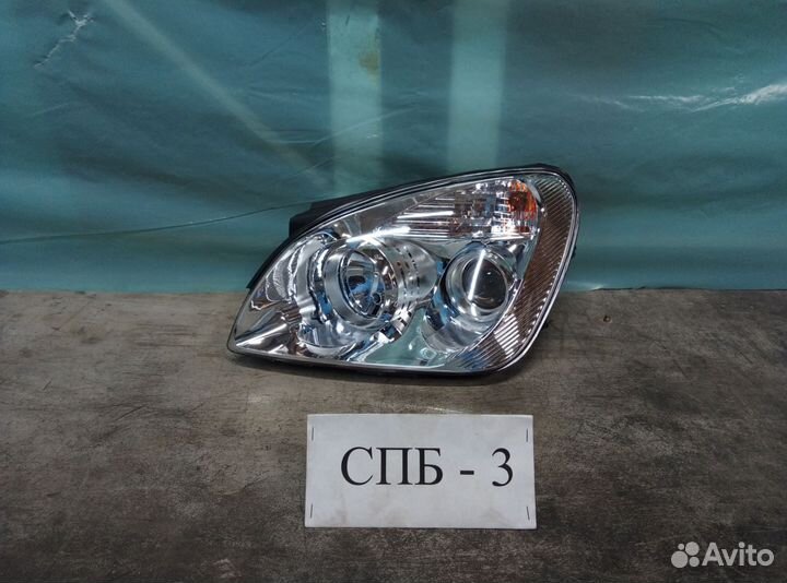 Фара левая Kia Carens 3