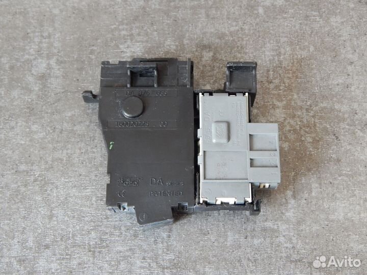 Замок люка (двери) ст.машины Ariston C00111494