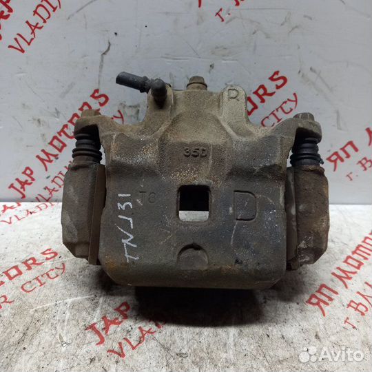 Суппорт тормозной передний правый Nissan Teana J31