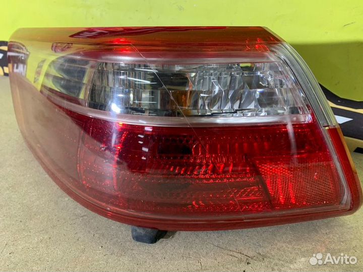 Фонарь заднего хода левый Toyota Camry ACV40