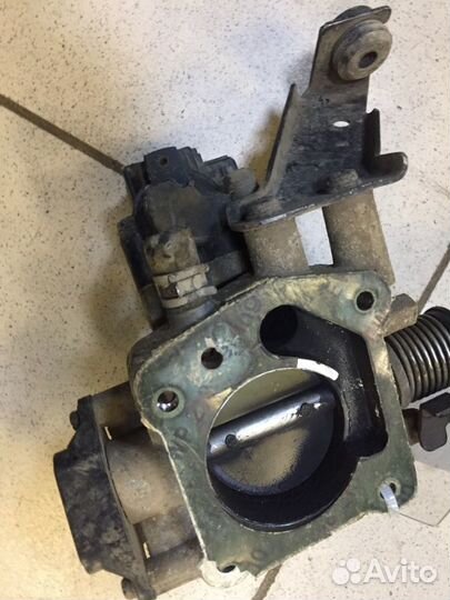 Дросельная заслонка Kia Spectra S6D