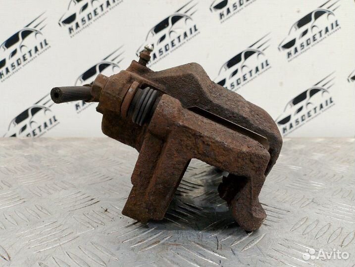 Суппорт тормозной передний левый Nissan Qashqai