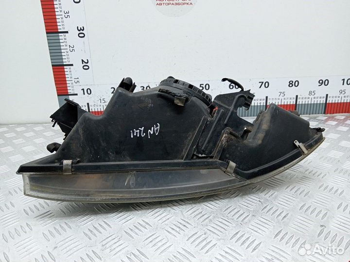 Фара передняя для Mitsubishi Carisma MR972794