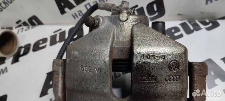 Суппорт тормозной передний правый Volkswagen