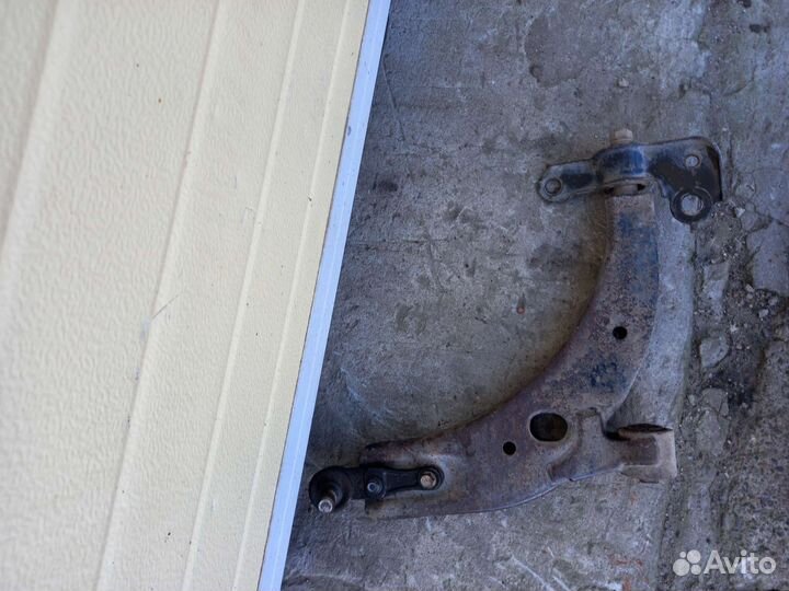 Киа спектра левый рычаг