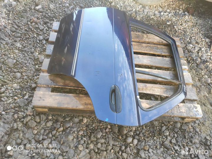 Дверь задняя левая Kia Sephia