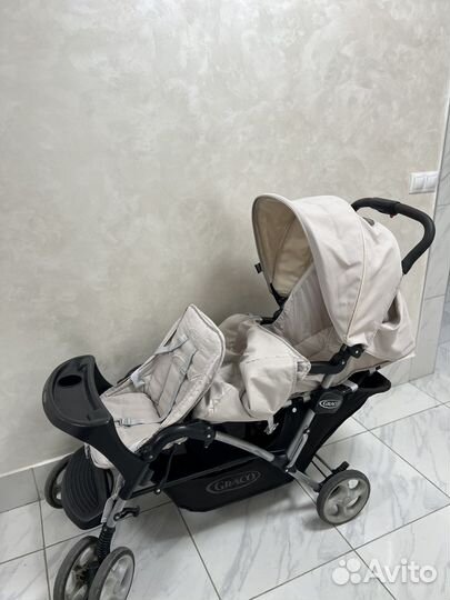 Коляска для погодок