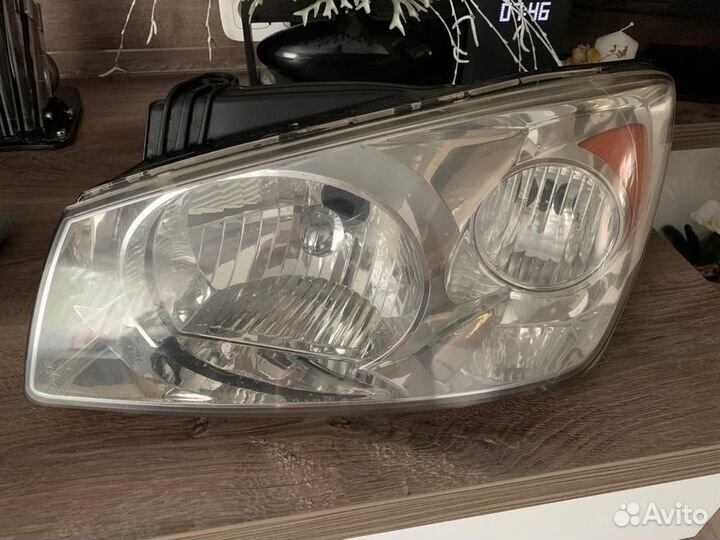 Фара KIA Cerato 1 левая Оригинальная