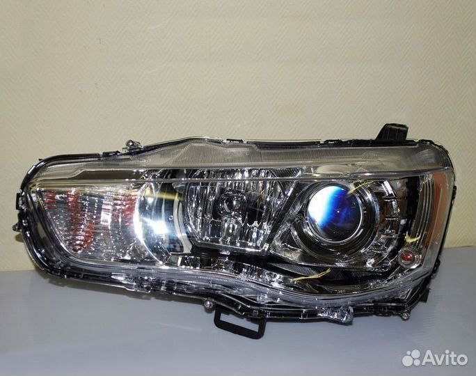 Фара левая Митсубиси Аутлендер 2 хл XL 2010