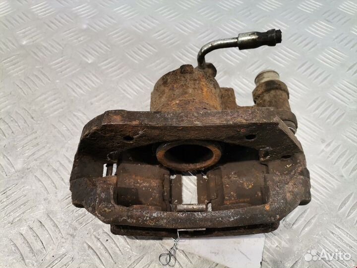 Суппорт передний правый Ford Escort 5 2-й рест