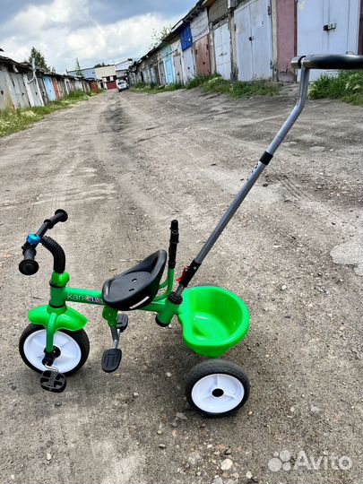 Трехколесный велосипед с ручкой