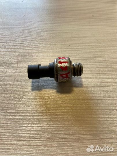 Датчик давления масла левый Opel Astra H