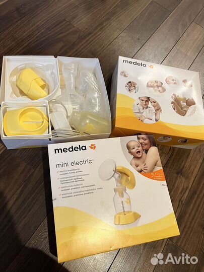 Молокоотсос medela электрический