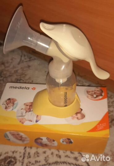 Молокоотсос medela ручной