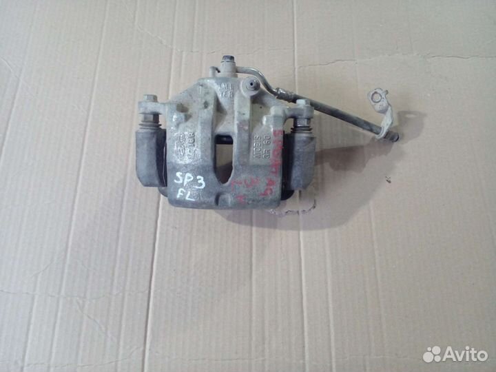 Суппорт тормозной передний Kia Sportage 3