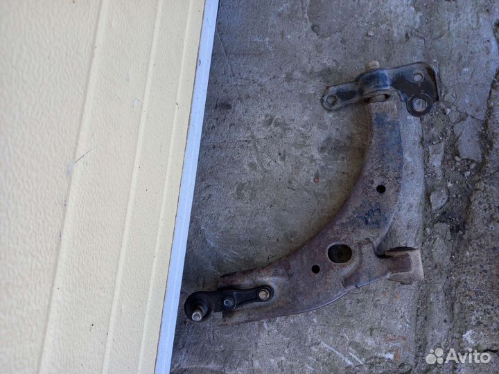 Киа спектра левый рычаг