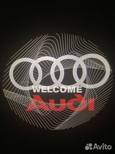 Проекция в дверь audi