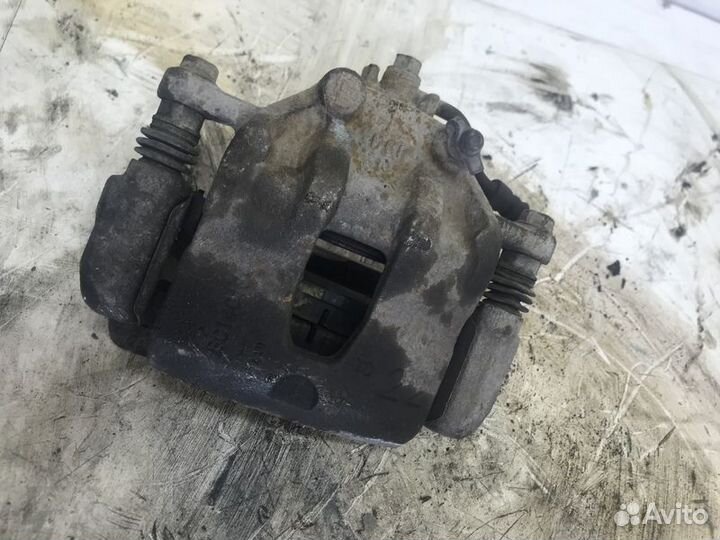 Суппорт тормозной передний левый Hyundai Solaris