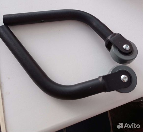 Антиопрокидыватель для инвалидной коляски