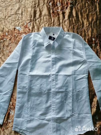 Продам новую рубашку на мальчика 164-170