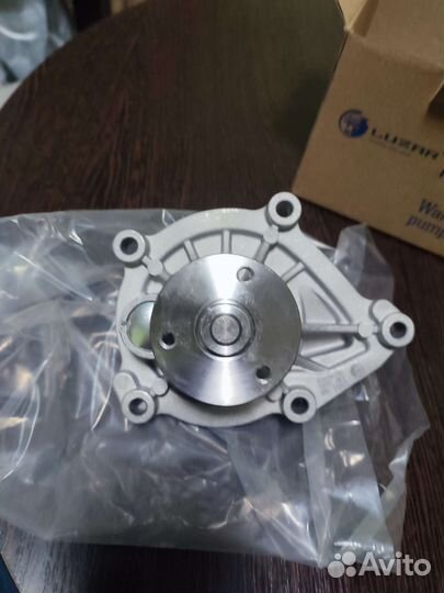 Водяной насос (помпа) для Peugeot 308 (EP6)