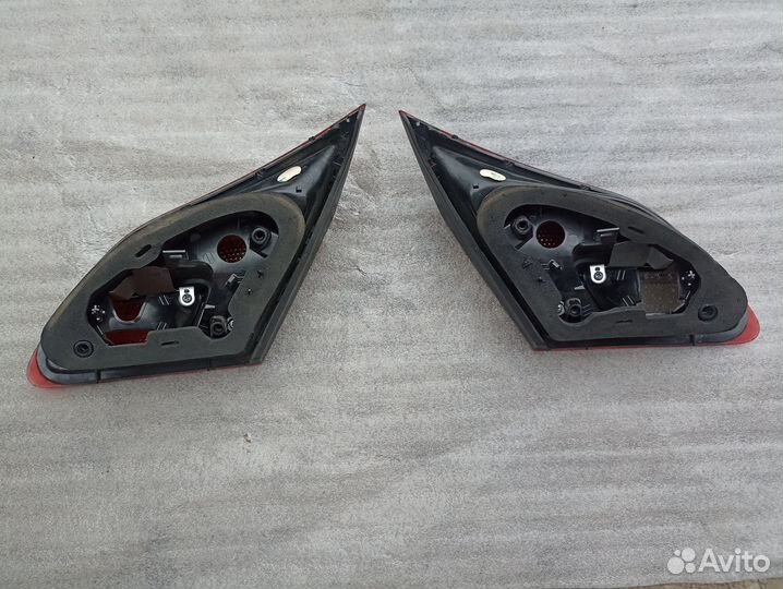 Фонарь в крышку багажника Opel Astra J 2009-2016