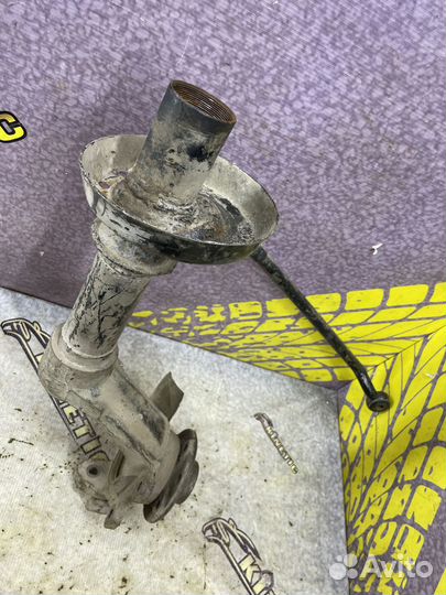 Кулак поворотный в сборе левый 16V Nexia Нексия