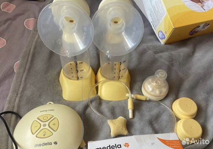 Молокоотсос электрический medela swing maxi