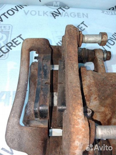 Суппорт тормозной задний левый Hyundai Solaris 1