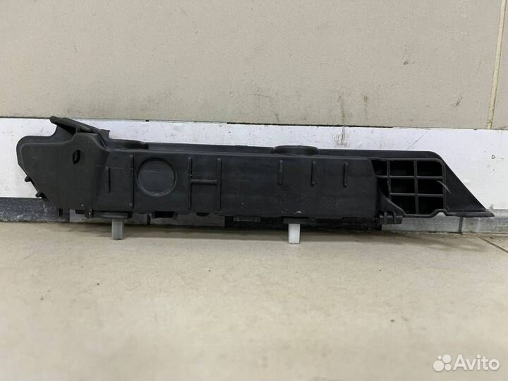 Кронштейн переднего бампера правый Kia Rio 2 JB 20