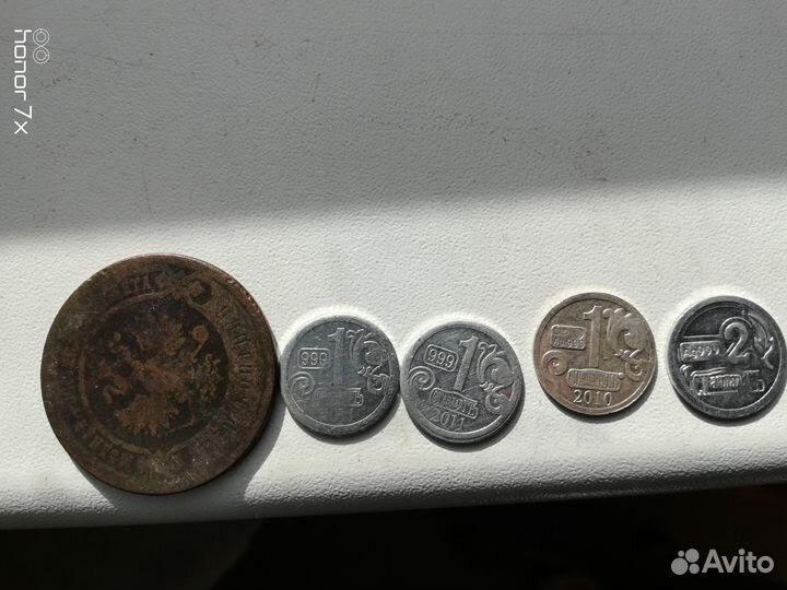 Монеты и жетоны