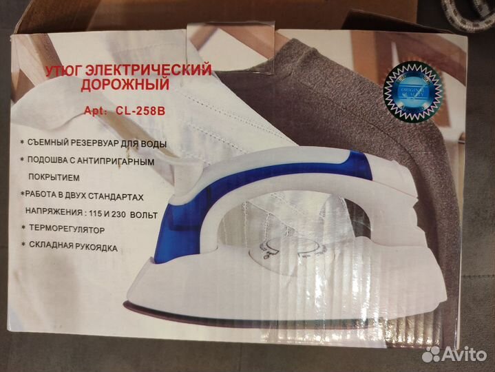 Новый электрический утюг дорожный