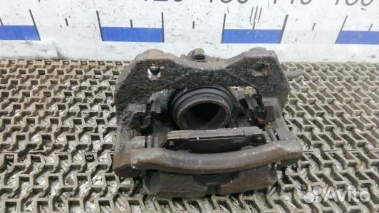 Суппорт тормозной передний правый nissan primera P