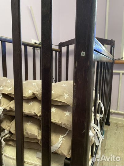 Кроватка для новорожденных с маятником