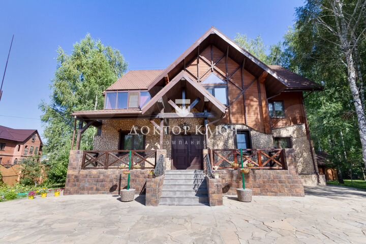 Коттедж 481 м² на участке 18 сот.