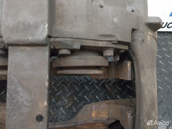 21487605 Суппорт передний правый