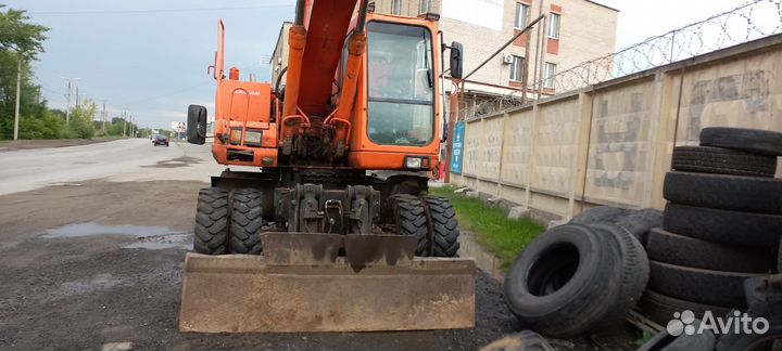 Колёсный экскаватор DOOSAN Daewoo SOLAR 210W-V, 2011