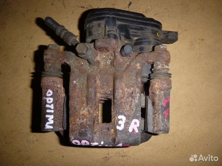 Суппорт задний правый KIA optima 2015