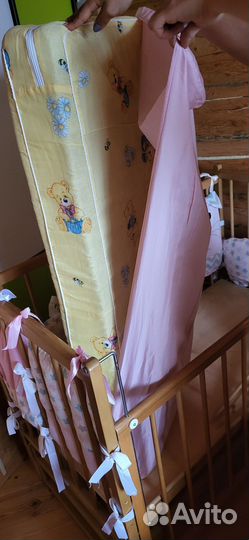 Детская кроватка с продольным маятником