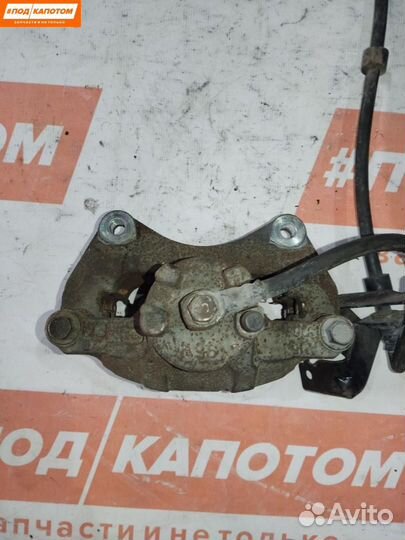 Суппорт тормозной передний левый Mitsubishi 2