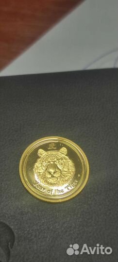 Золотая монета тигр