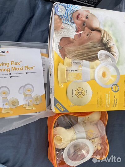 Молокоотсос medela электрический swing maxi flex